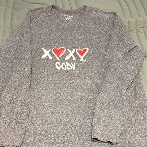 Peloton “XOXO, Cody” sweatshirt